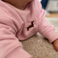 Baby-Sweatshirt mit Dackel-Stick